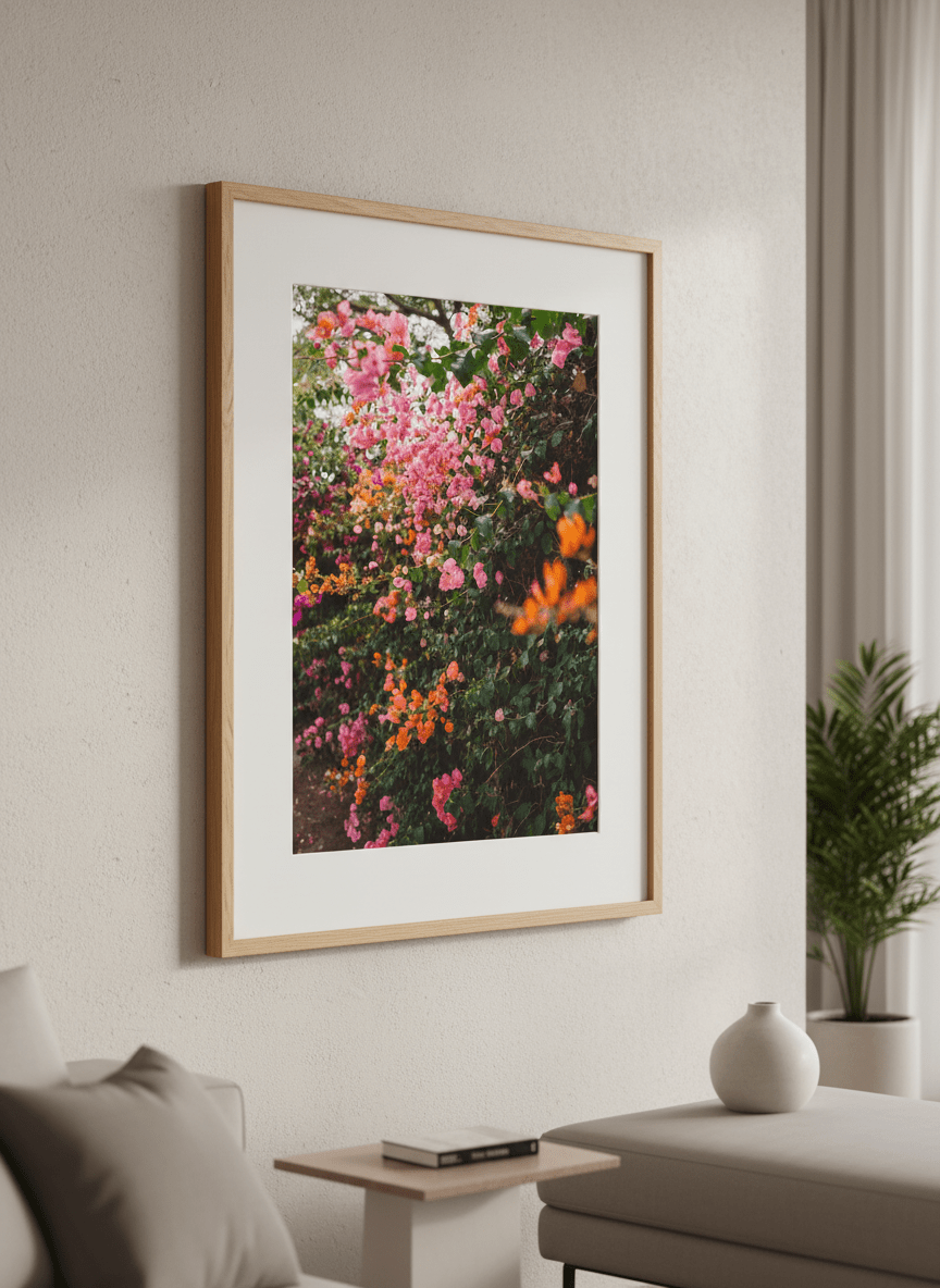 Modern wall art styled above a sofa in a neutral living room