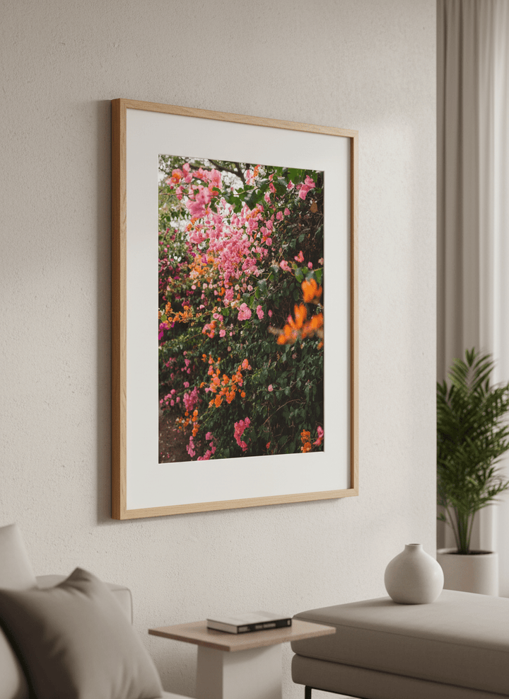 Modern wall art styled above a sofa in a neutral living room