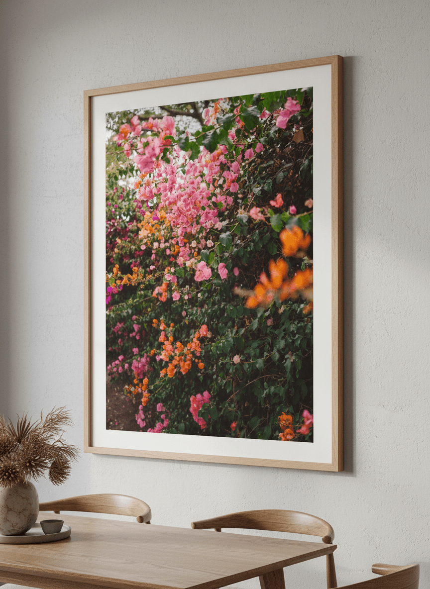 Wall art styled above a dining table in a contemporary home