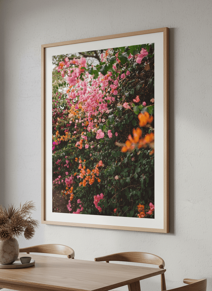 Wall art styled above a dining table in a contemporary home