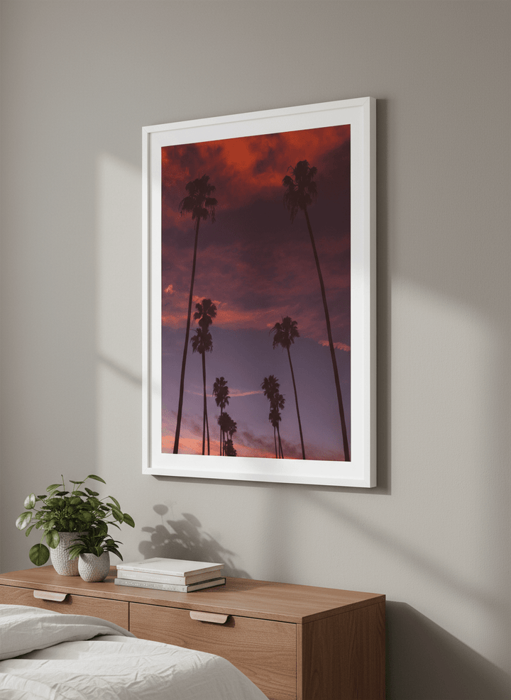 Minimalist artwork displayed in a calm, light-filled bedroom interior