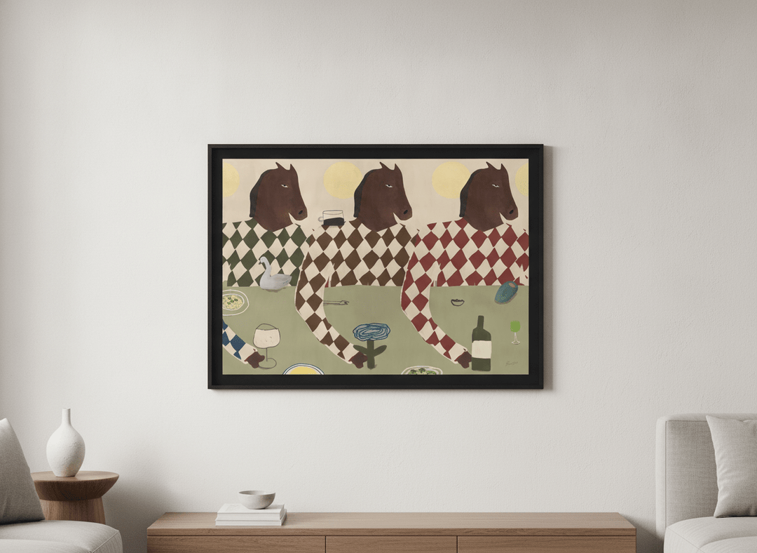 Modern wall art styled above a sofa in a neutral living room