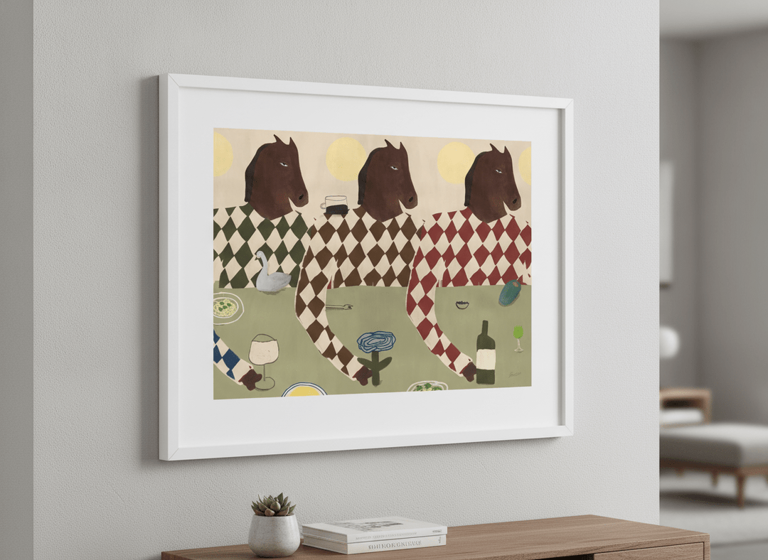 Modern wall art styled above a sofa in a neutral living room