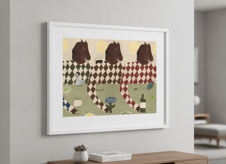 Modern wall art styled above a sofa in a neutral living room