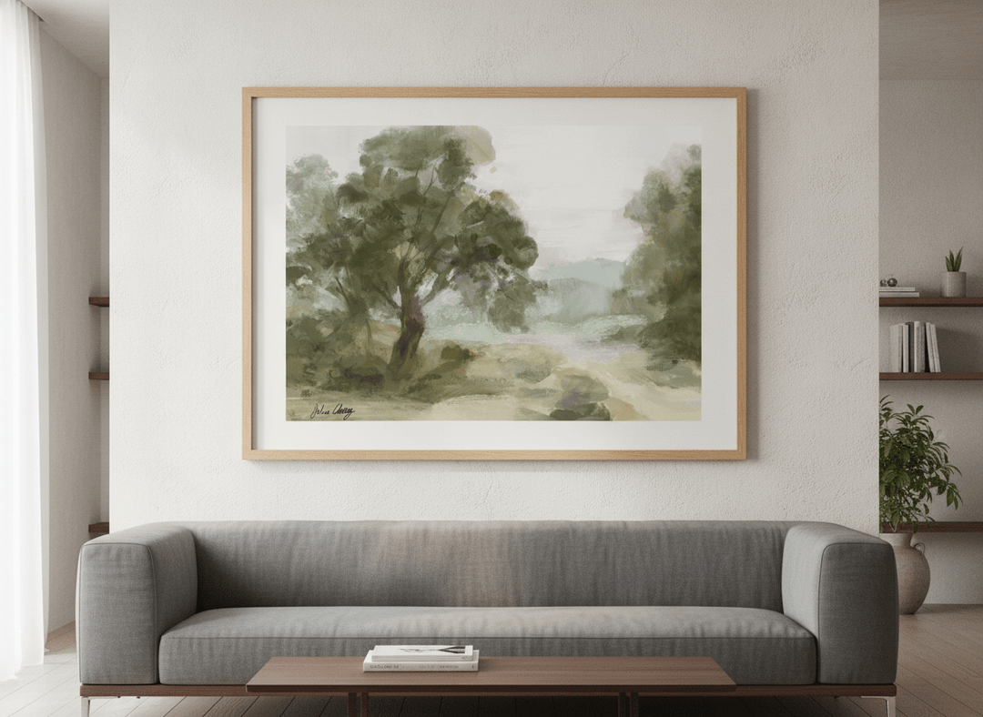 Modern wall art styled above a sofa in a neutral living room