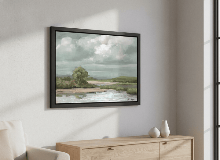 Artwork displayed above a credenza in a real-looking contemporary home