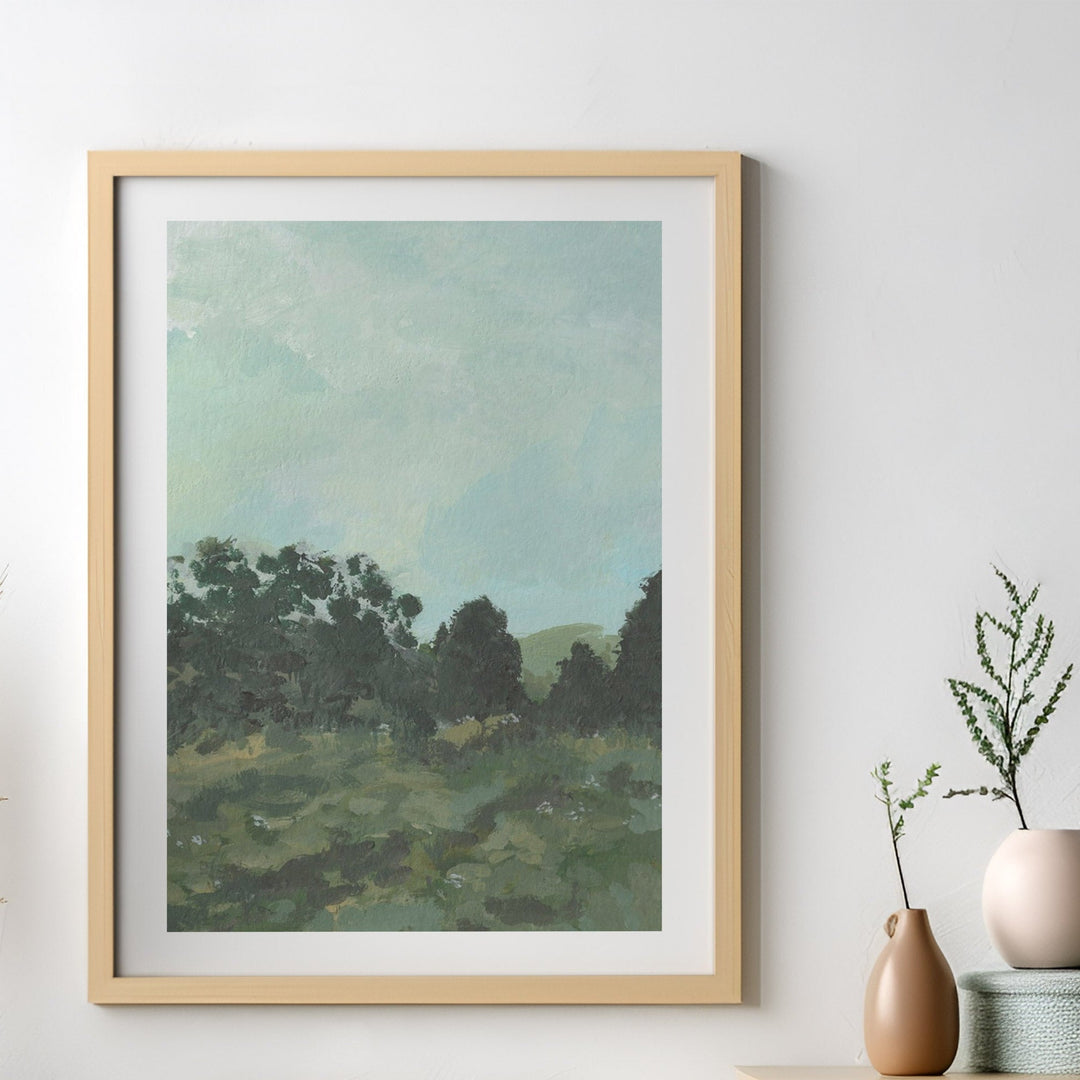 Artwork of a landscape with trees and a sky, displayed on a wall with decorative vases.