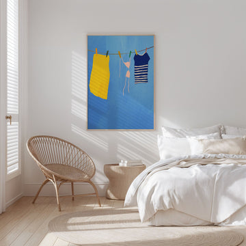 Bedroom with a chair, nightstand, and abstract art on the wall
