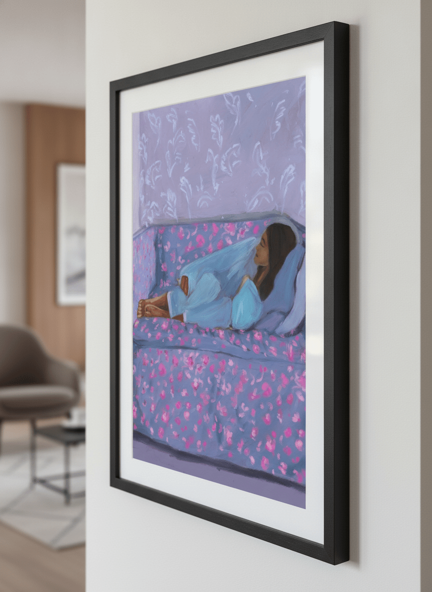 Modern wall art styled above a sofa in a neutral living room