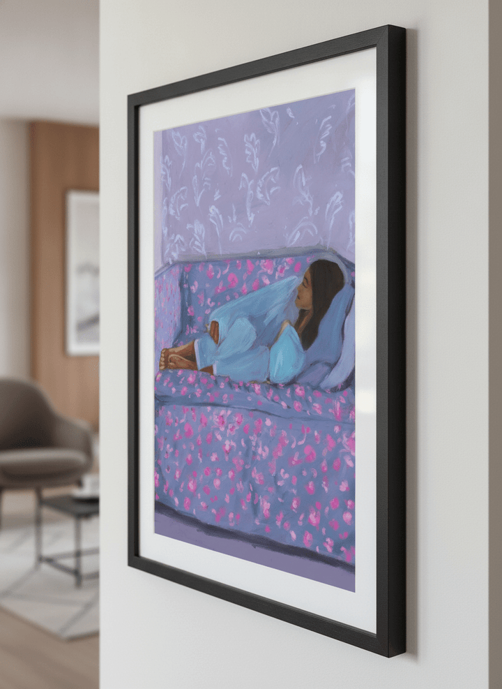 Modern wall art styled above a sofa in a neutral living room