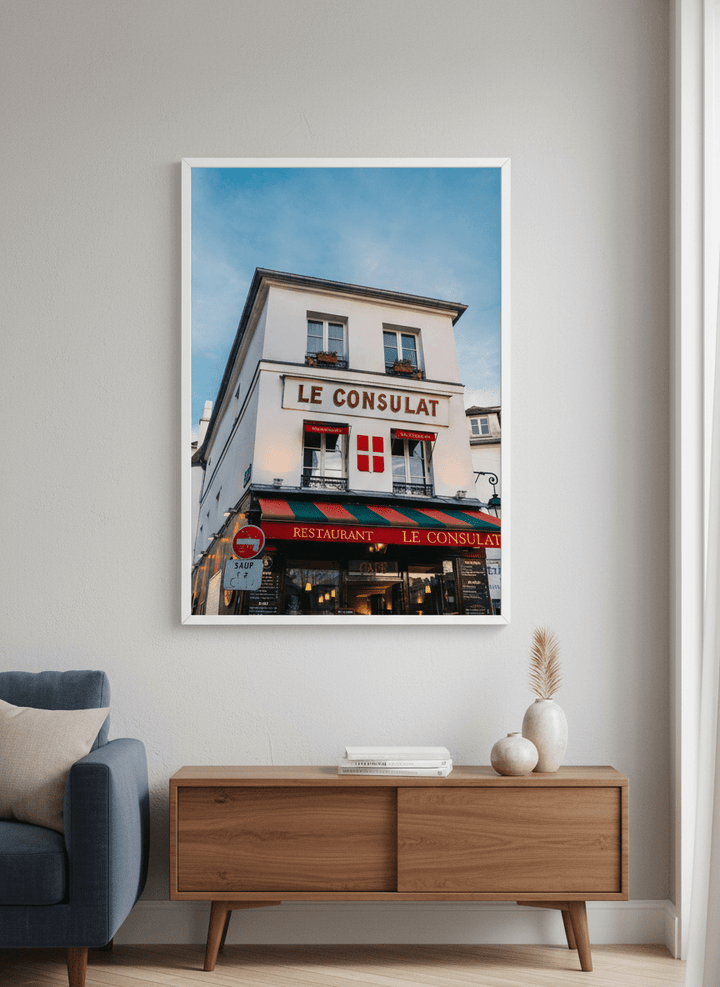 Modern wall art styled above a sofa in a neutral living room