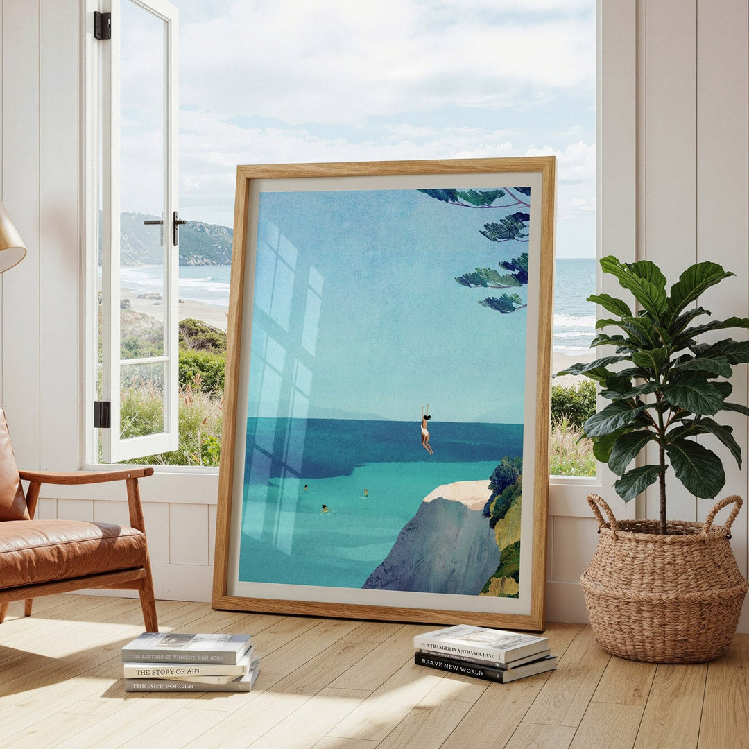 artwork of a beach scene in a modern living room with a chair and plant.