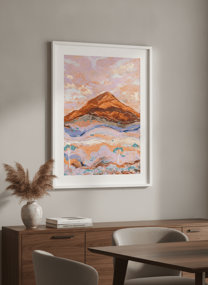 Wall art styled above a dining table in a contemporary home