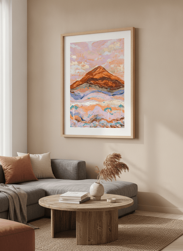 Modern wall art styled above a sofa in a neutral living room