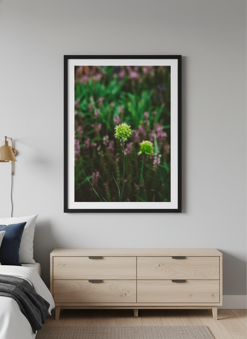 Minimalist artwork displayed in a calm, light-filled bedroom interior