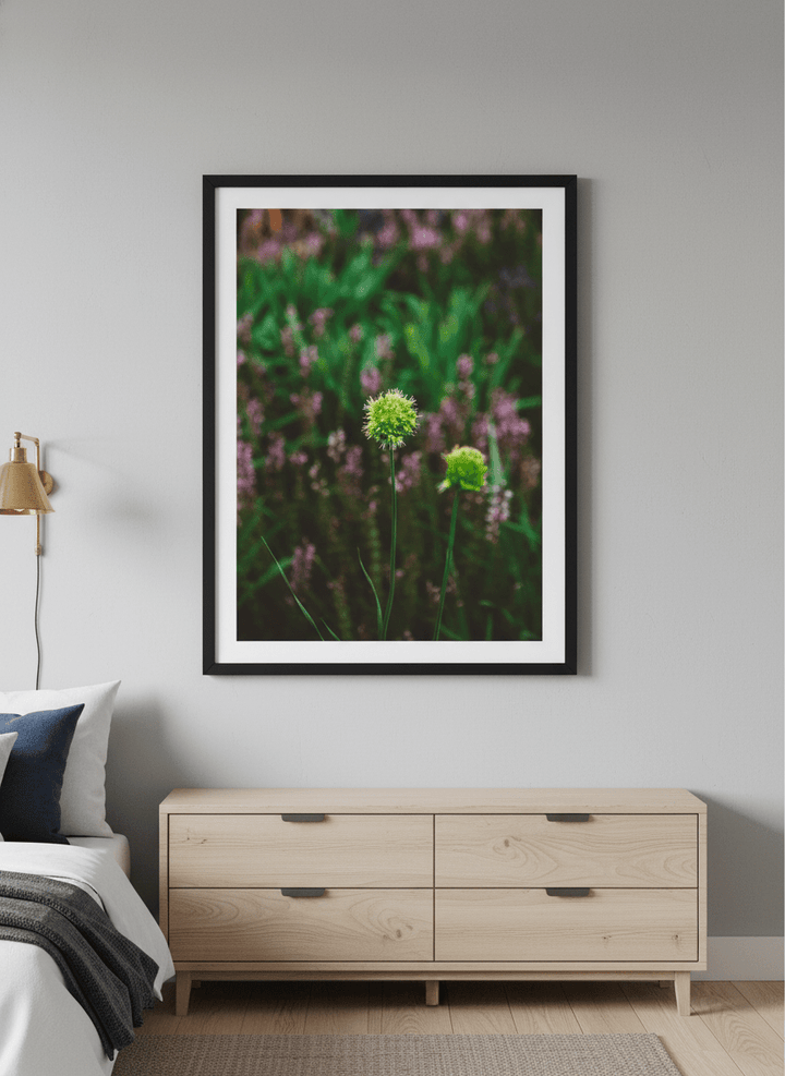 Minimalist artwork displayed in a calm, light-filled bedroom interior