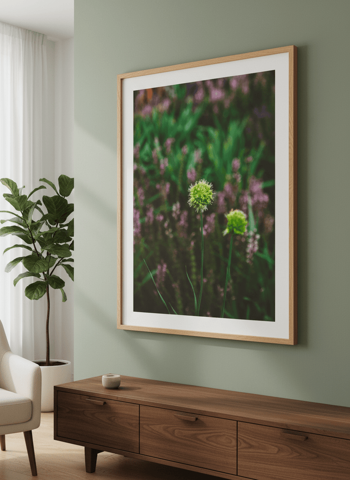 Modern wall art styled above a sofa in a neutral living room