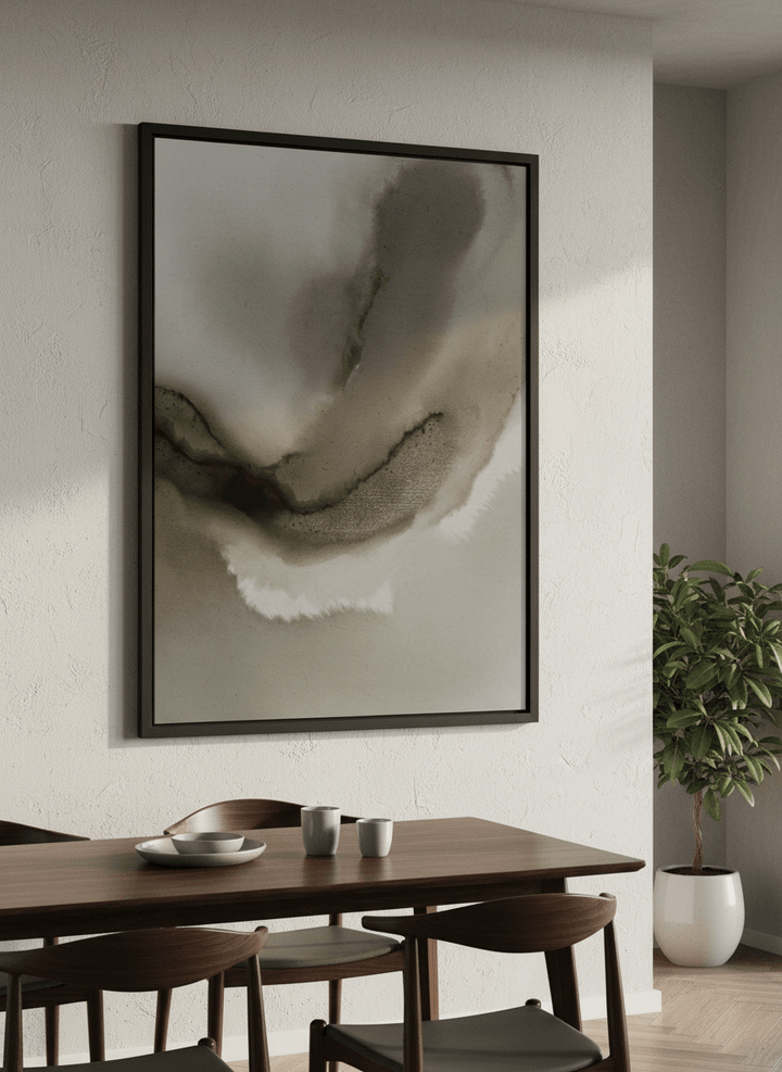 Wall art styled above a dining table in a contemporary home