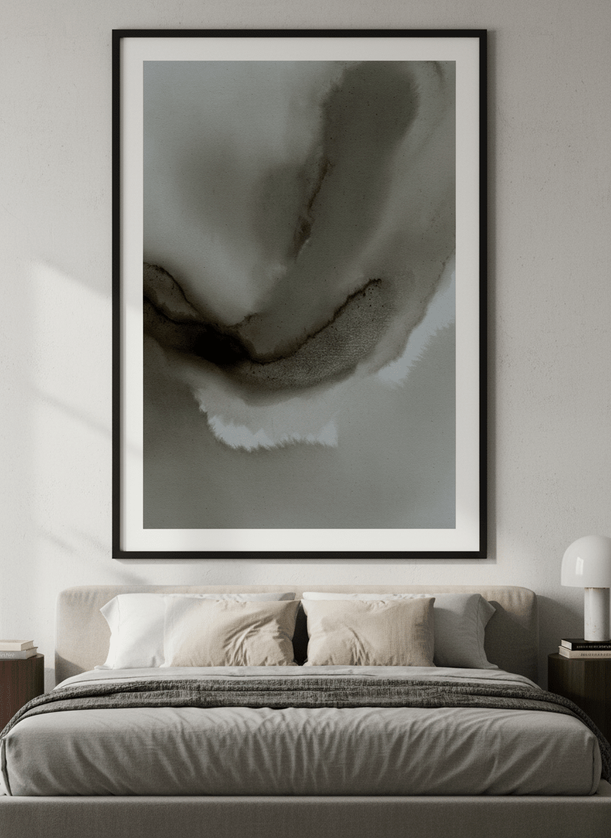 Minimalist artwork displayed in a calm, light-filled bedroom interior