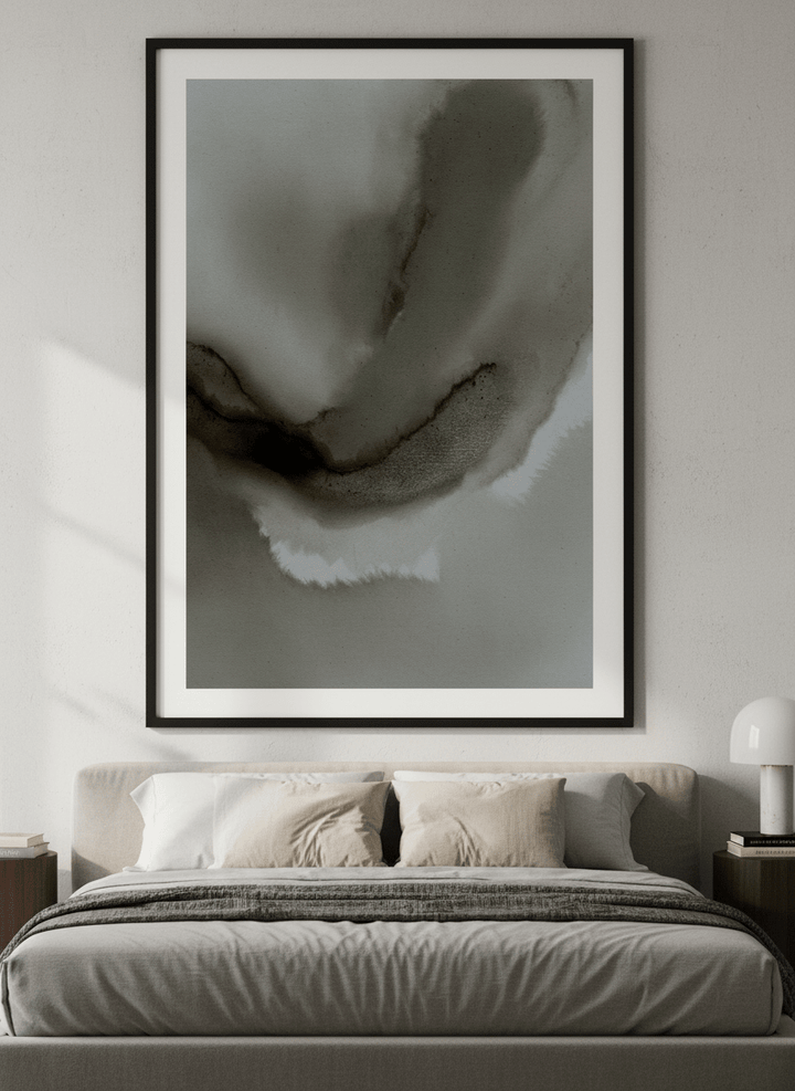 Minimalist artwork displayed in a calm, light-filled bedroom interior
