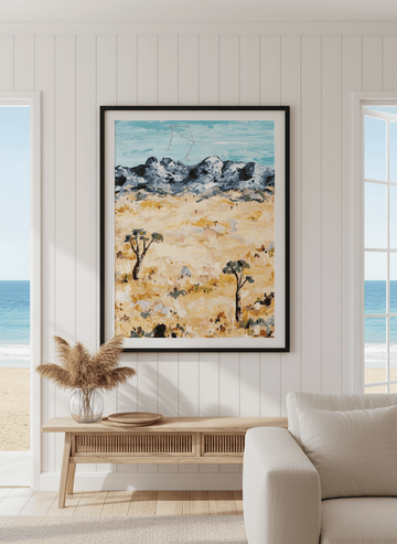 Neutral wall art displayed in a sunny coastal beach house