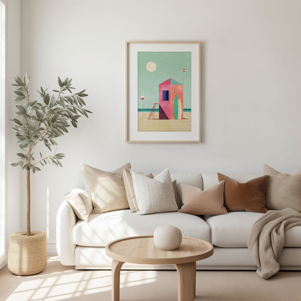 Modern living room with a white sofa, decorative pillows, a wooden coffee table, and a colorful abstract painting on the wall.
