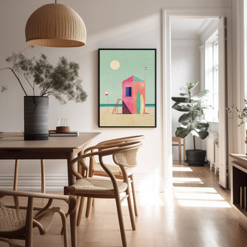 Dining room with wooden table and chairs, colorful abstract painting on the wall, and natural light.