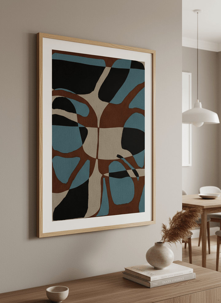 Wall art styled above a dining table in a contemporary home