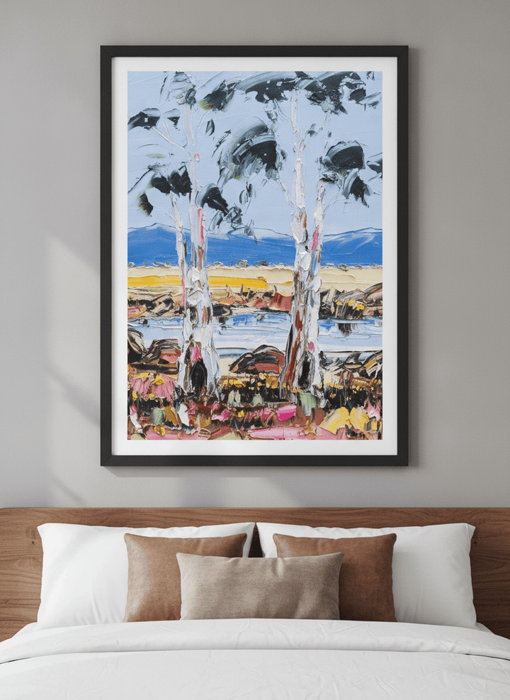 Minimalist artwork displayed in a calm, light-filled bedroom interior