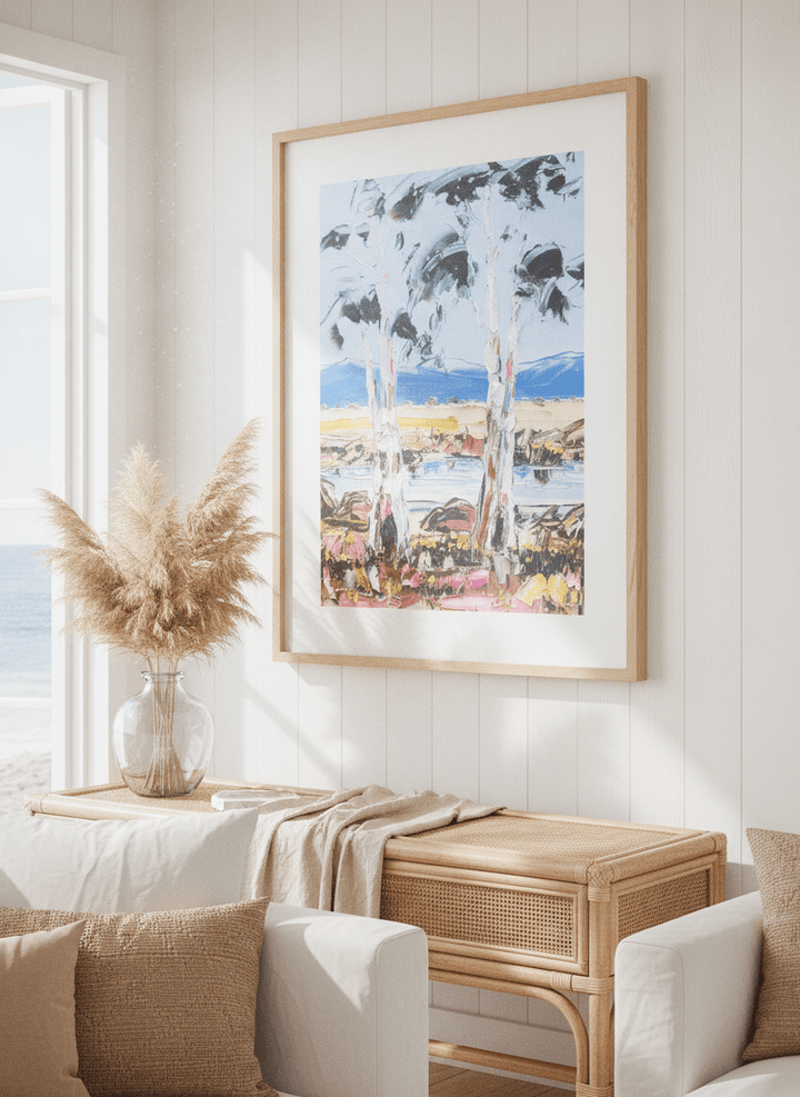 Neutral wall art displayed in a sunny coastal beach house