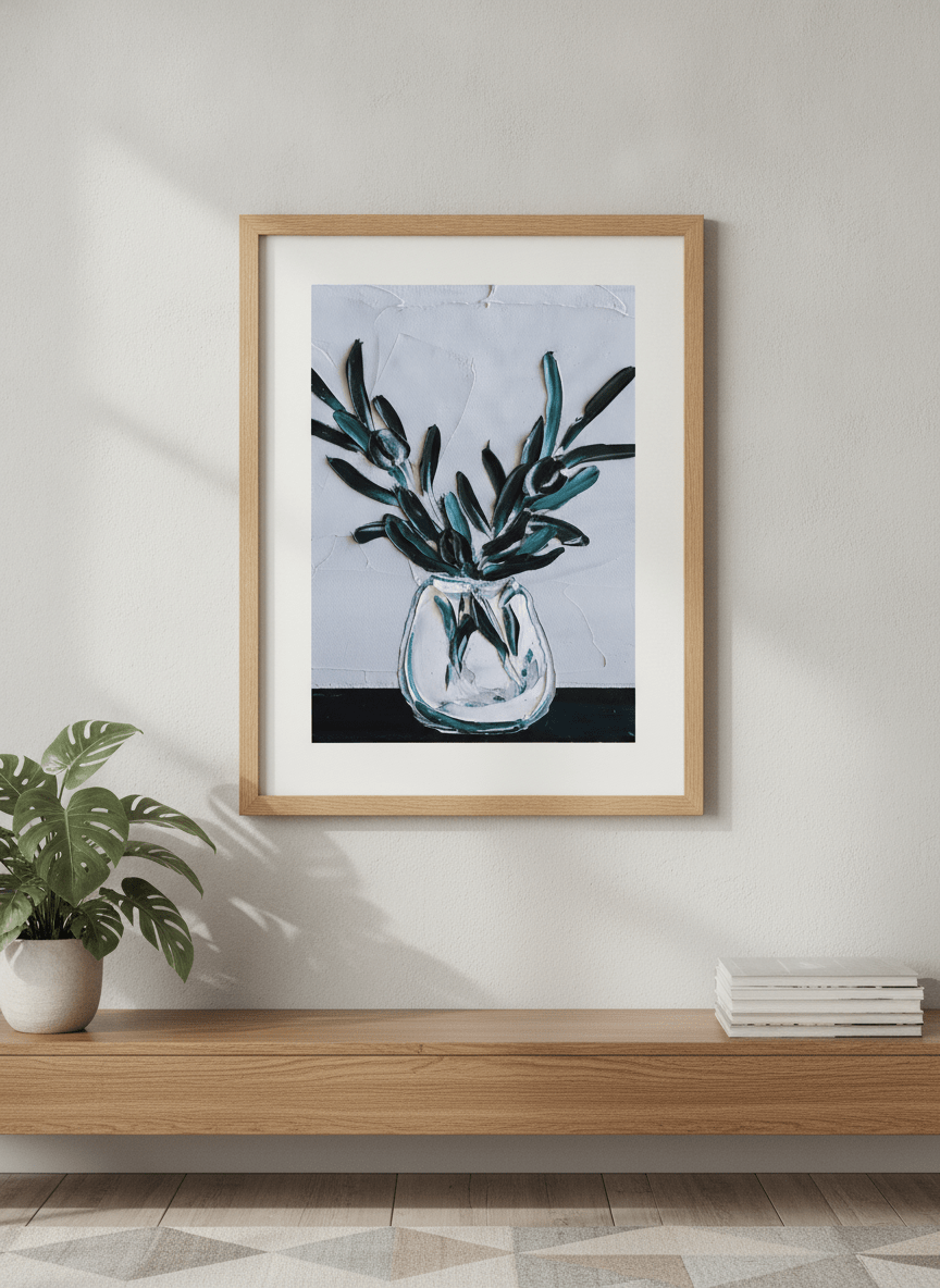 Modern wall art styled above a sofa in a neutral living room