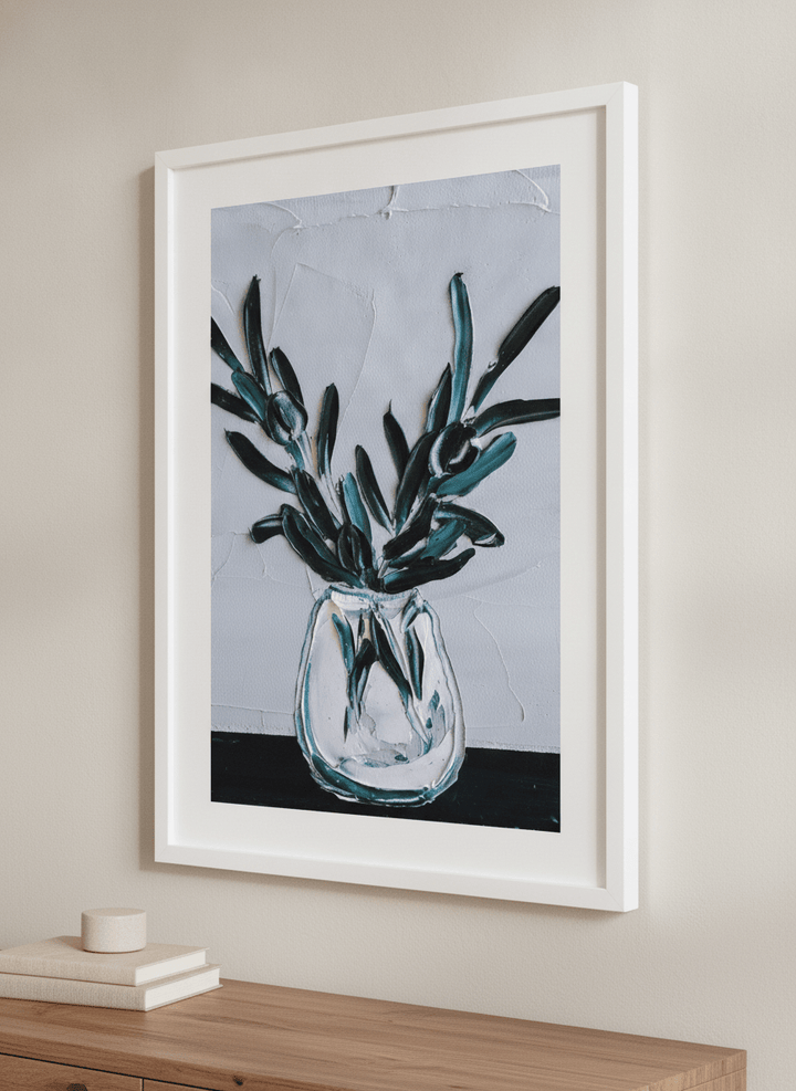 Minimalist artwork displayed in a calm, light-filled bedroom interior