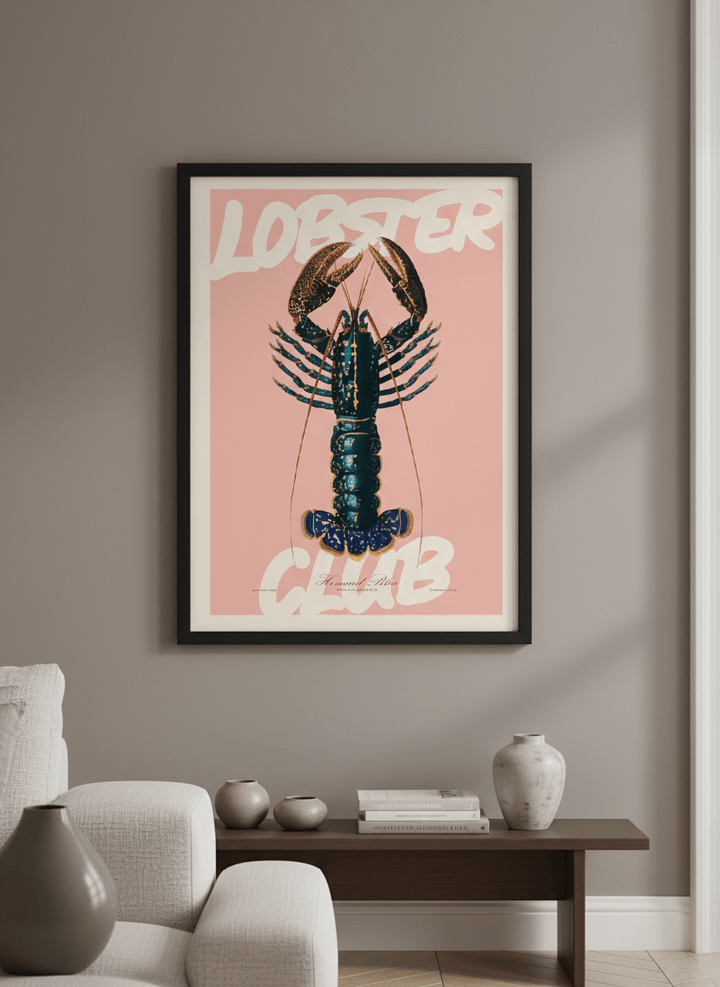 Modern wall art styled above a sofa in a neutral living room