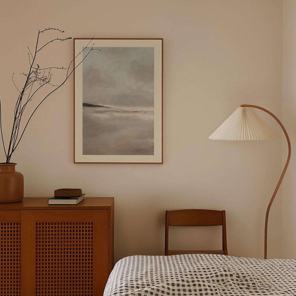 Bedroom interior with wooden cabinet, bed, and artwork on the wall.