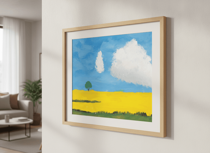Modern wall art styled above a sofa in a neutral living room