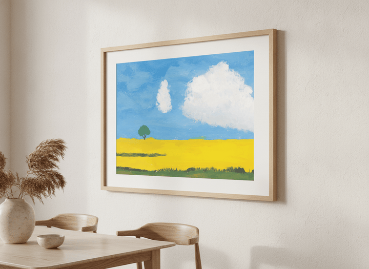 Wall art styled above a dining table in a contemporary home