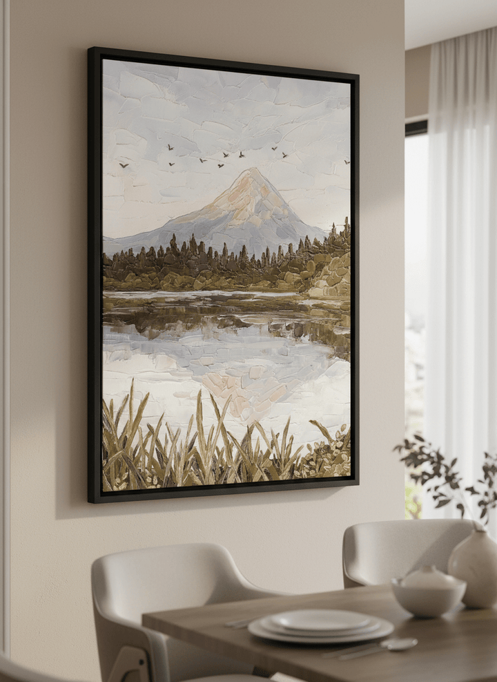 Wall art styled above a dining table in a contemporary home