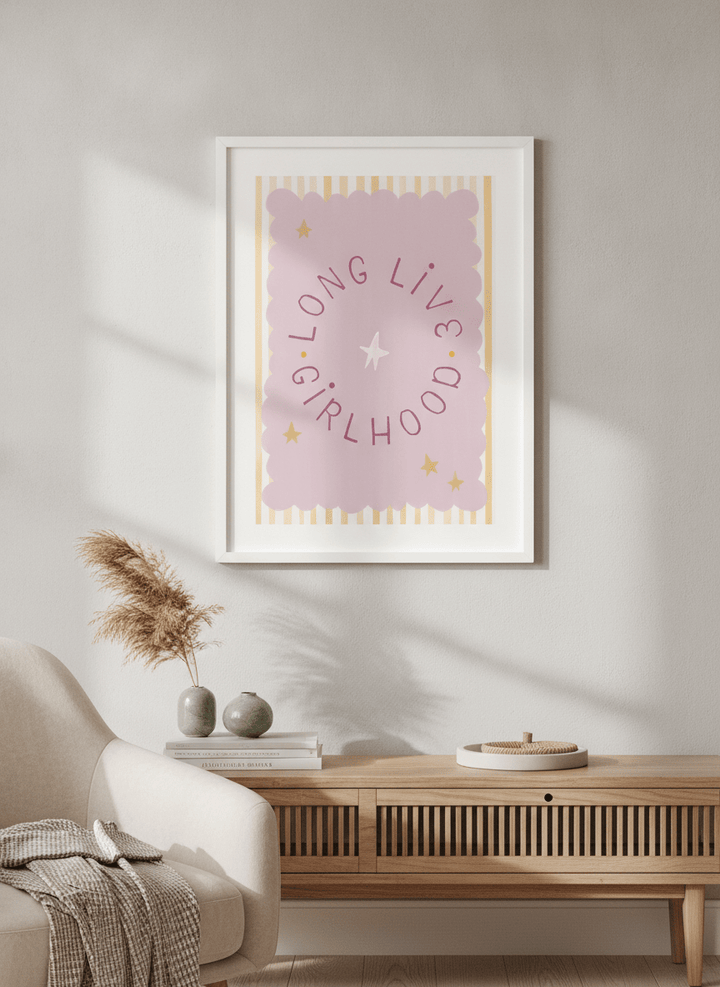 Modern wall art styled above a sofa in a neutral living room