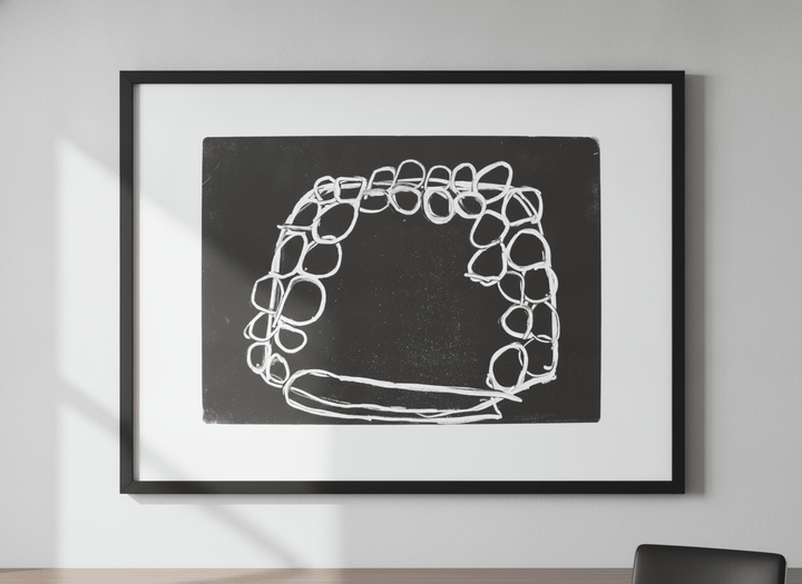 Contemporary wall art featured in a bright modern office workspace