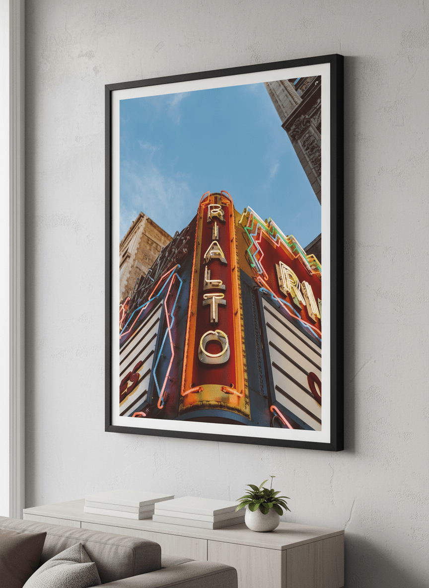 Modern wall art styled above a sofa in a neutral living room