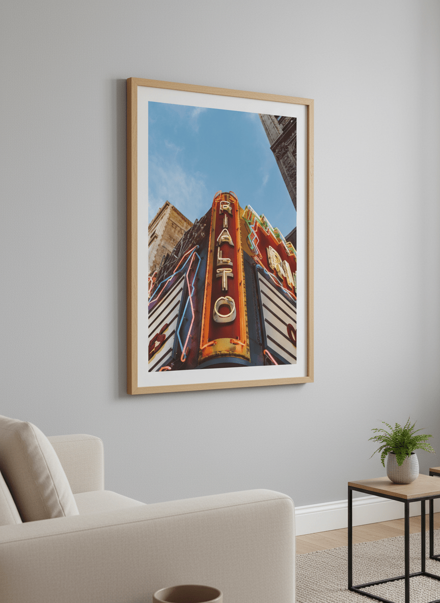 Modern wall art styled above a sofa in a neutral living room