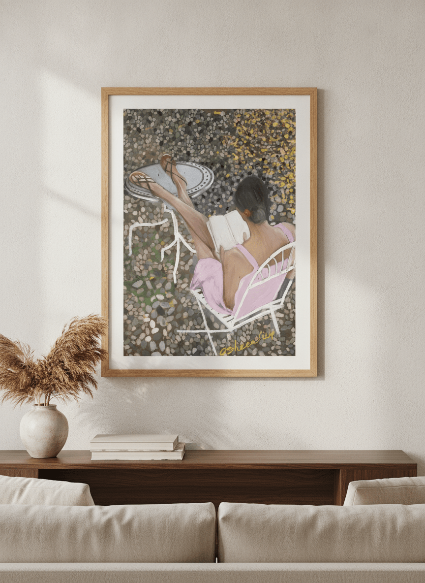 Modern wall art styled above a sofa in a neutral living room