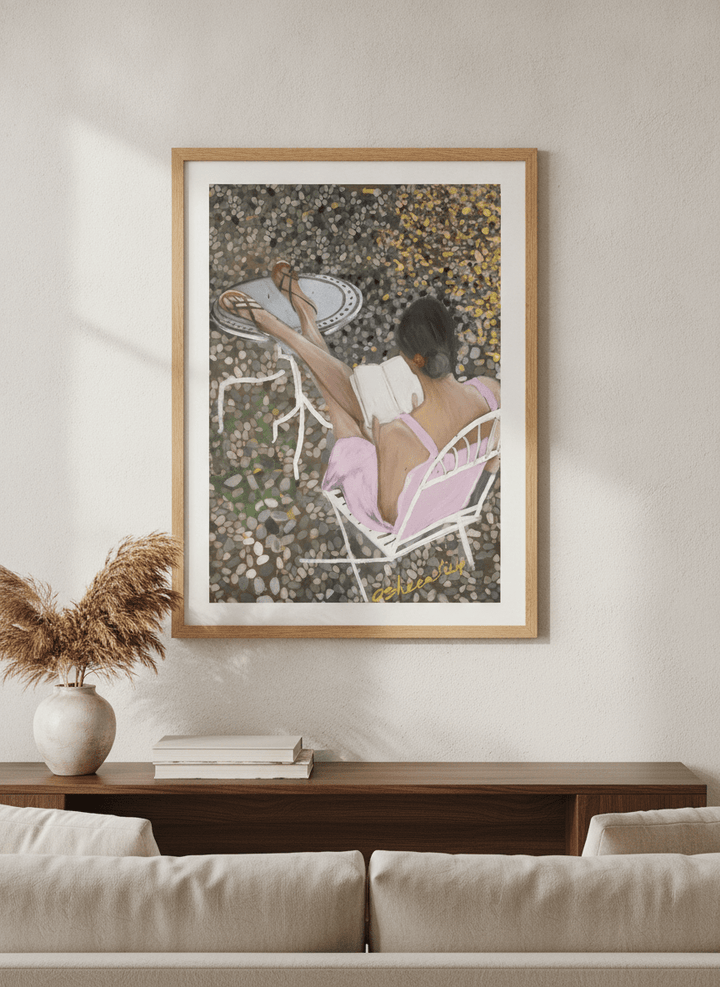 Modern wall art styled above a sofa in a neutral living room