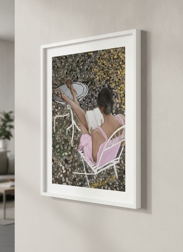 Modern wall art styled above a sofa in a neutral living room
