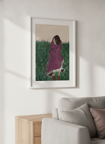 Artwork displayed above a credenza in a real-looking contemporary home
