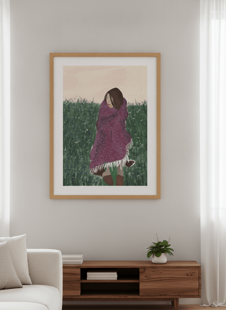 Modern wall art styled above a sofa in a neutral living room
