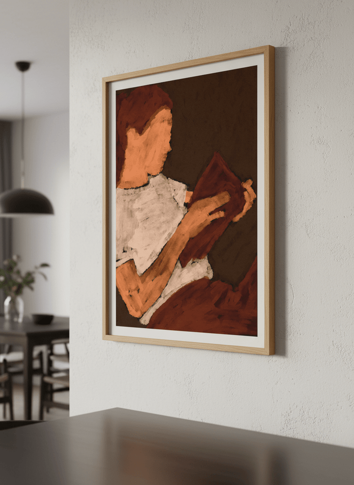 Wall art styled above a dining table in a contemporary home