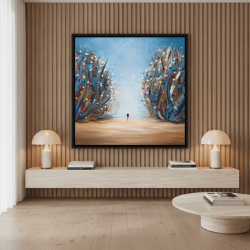 Oversized statement canvas wall art with a black surround styled on the wall in a luxe living room
