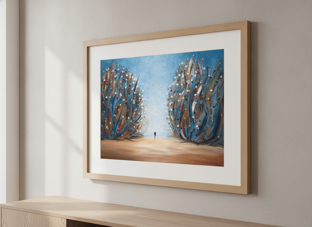 Modern wall art styled above a sofa in a neutral living room
