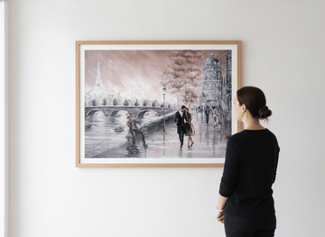 Person showcasing the artwork against a clean modern interior wall
